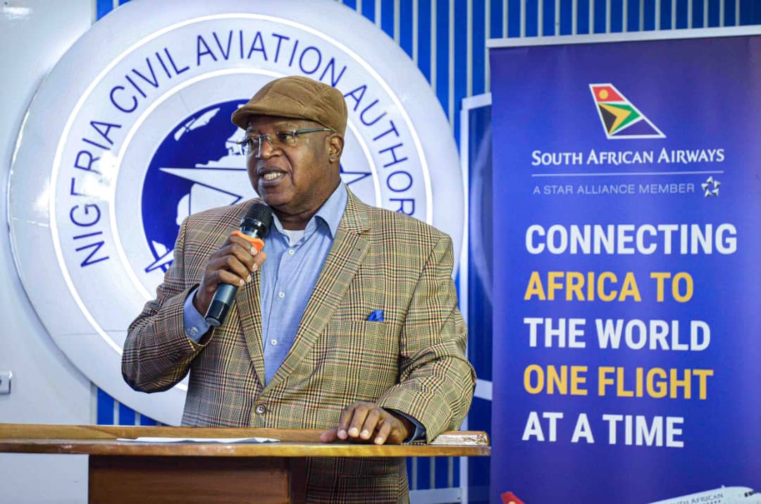 Portrait of Alex Nwuba speaking at an aviation industry event in Nigeria