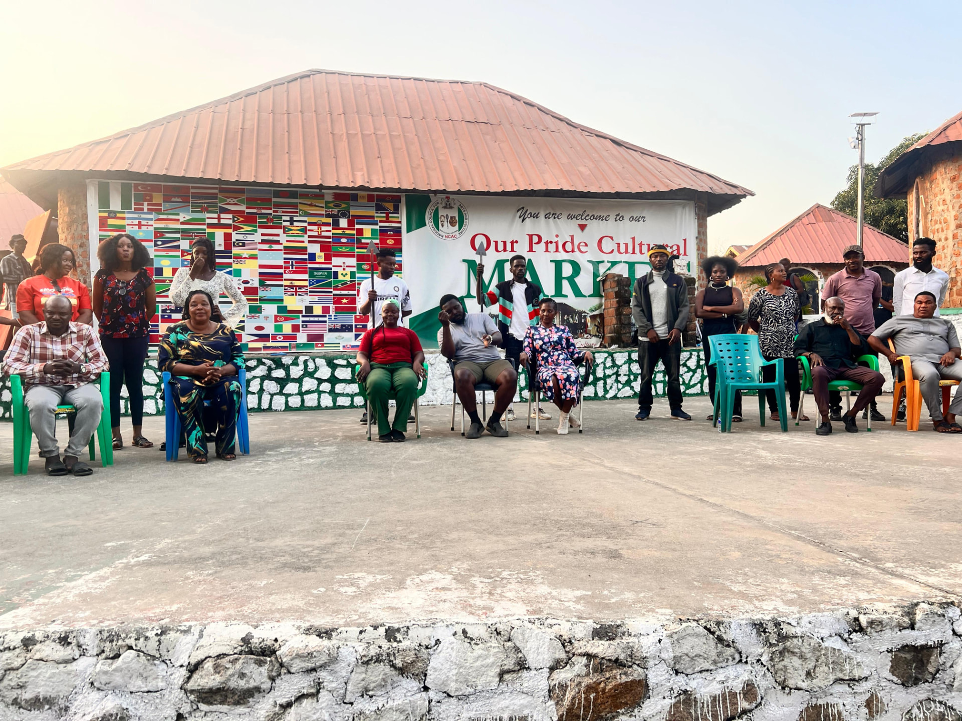 A group of practitioners and guests gathered at the Our Pride Cultural Market